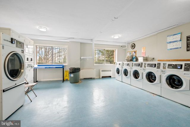 a view of a room with washer and dryer