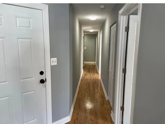 a view of hallway with shower