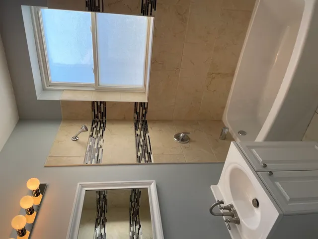 a room with window and stairs