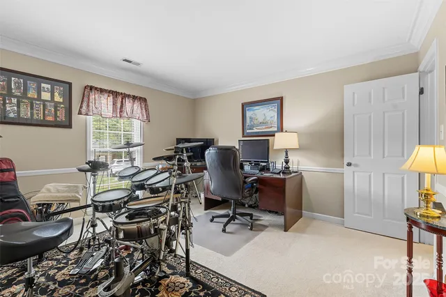 a workspace with furniture and a window