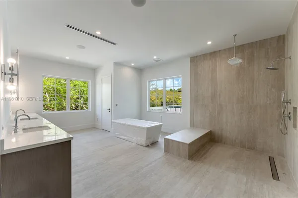 a living room with a couch and a window
