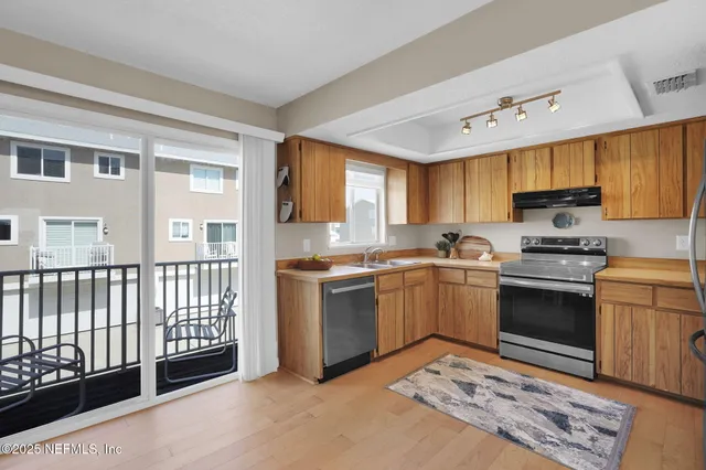 a room with a sink and a mirror