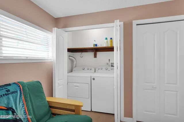 a view of swimming pool with outdoor seating