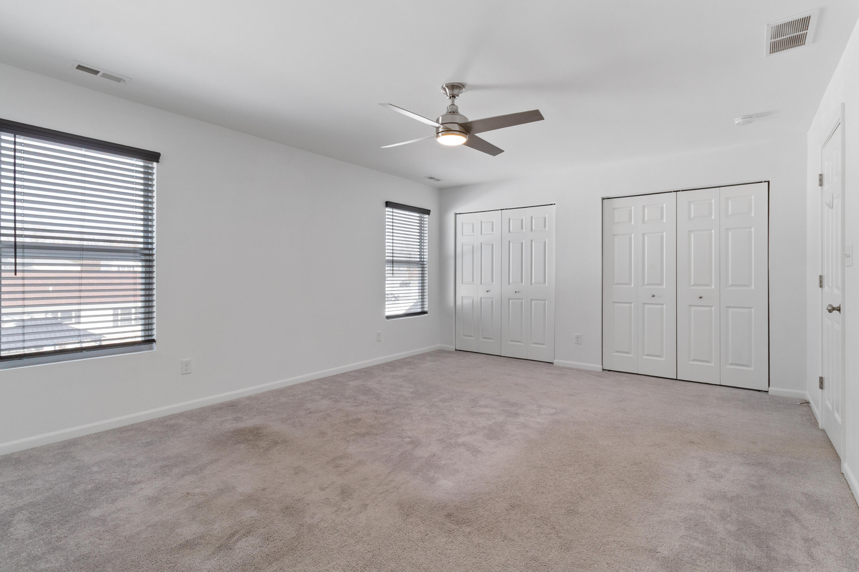 7485 Clark Street Merrillville, IN 46410 - Photo 20 of 26 a view of an empty room with a window