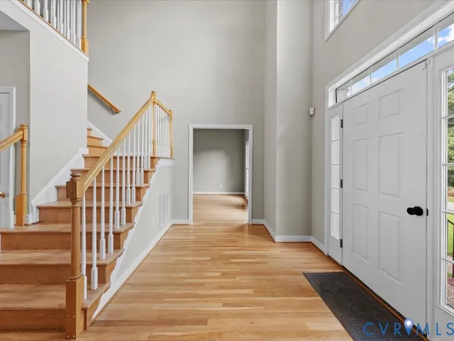 a view of a hallway view with staircase