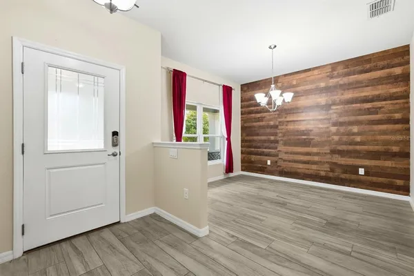 a kitchen with stainless steel appliances granite countertop a stove oven and a refrigerator