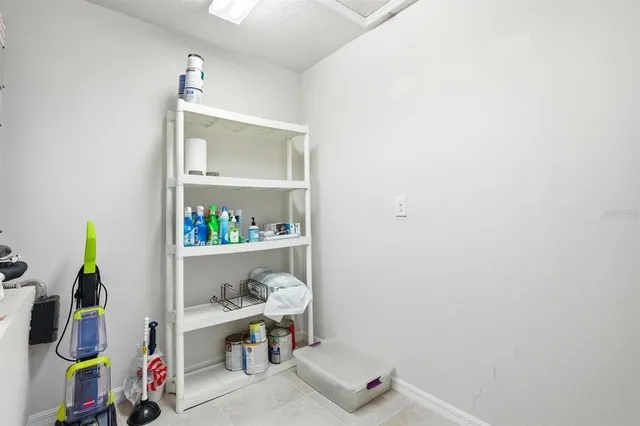 a view of a lake with houses in the back