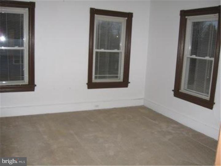 27 Ash Street, Unit B Delran, NJ 08075 - Photo 7 of 9 an empty room with a window