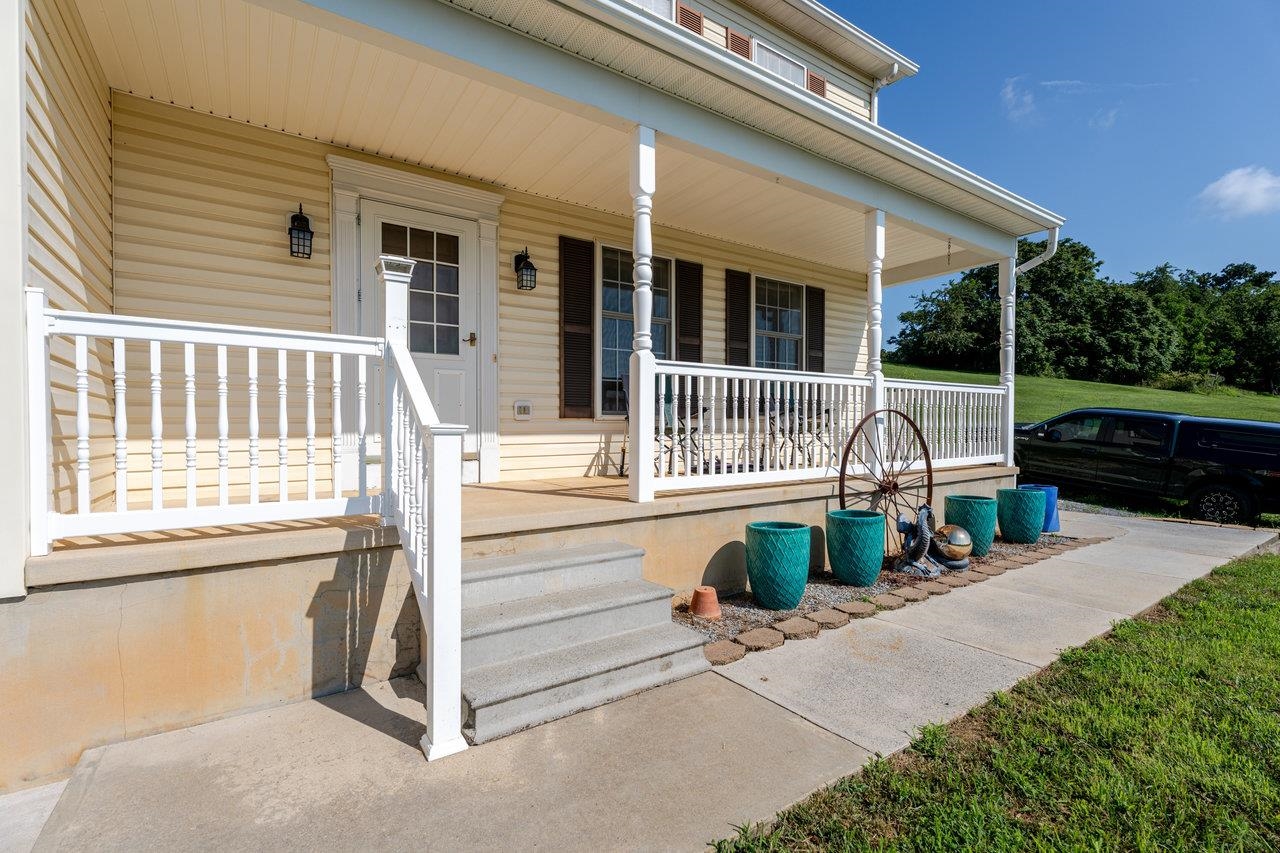 107 Orchard Road Staunton, VA 24401 - Photo 22 of 44 a front view of a house with a porch