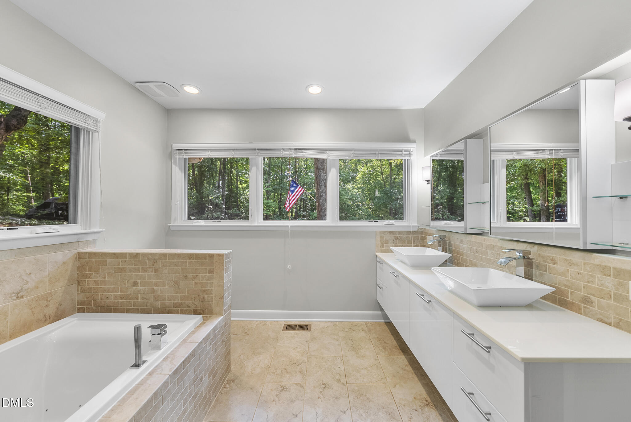 1605 Ridge Road Raleigh, NC 27607 - Photo 31 of 34 a bathroom with a large tub sink and window