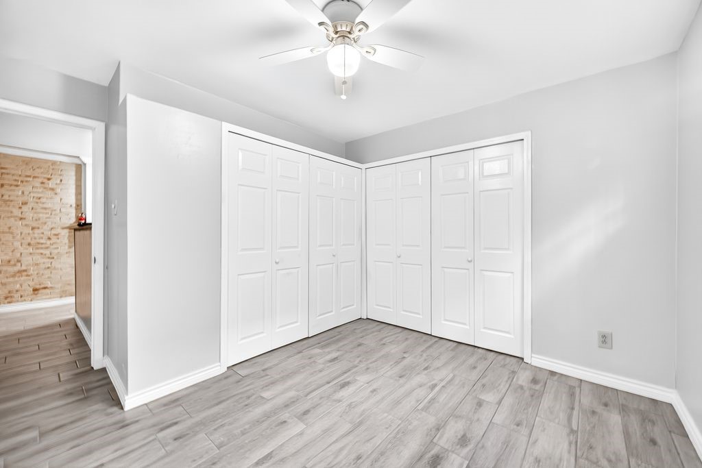 1418 Vermont Street, Unit 3 Houston, TX 77006 - Photo 9 of 11 a view of an empty room with wooden floor