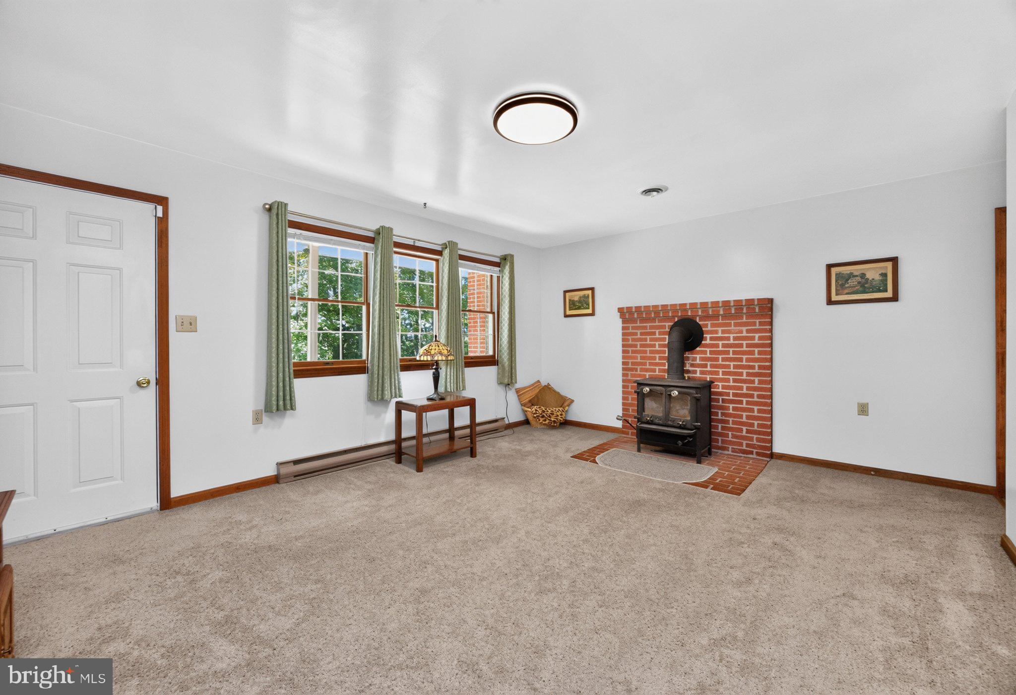 725 Ewing Road Cochranville, PA 19330 - Photo 5 of 55 Front door into the living room