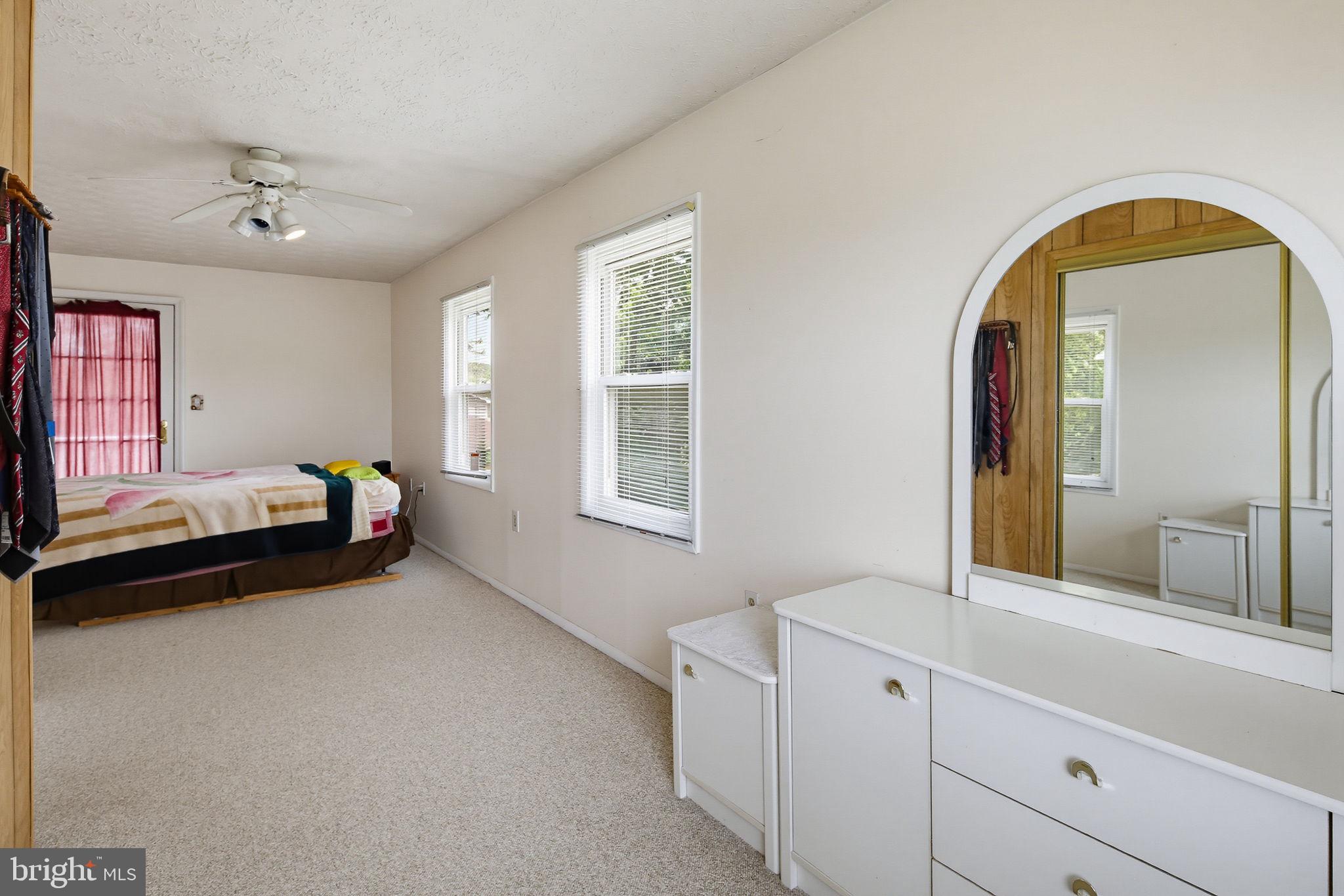 7802 Bastille Road Severn, MD 21144 - Photo 12 of 34 Bright and airy bedroom retreat.