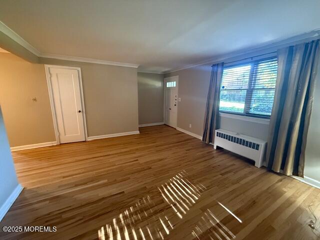 82 Manor Drive, Unit 803 Red Bank, NJ 07701 - Photo 3 of 39 a view of an empty room with wooden floor and a window