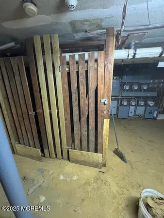 a view of a room with wooden walls