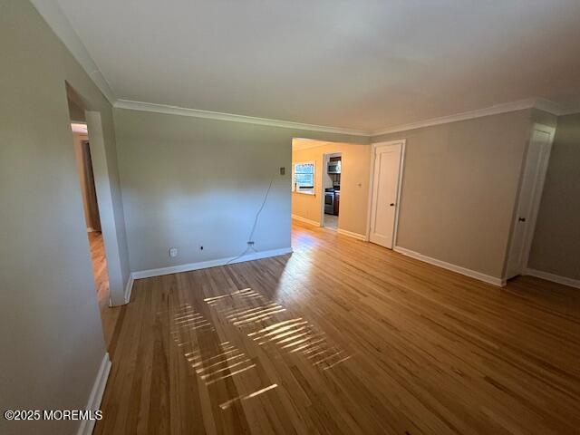 82 Manor Drive, Unit 803 Red Bank, NJ 07701 - Photo 5 of 39 an empty room with wooden floor and closet