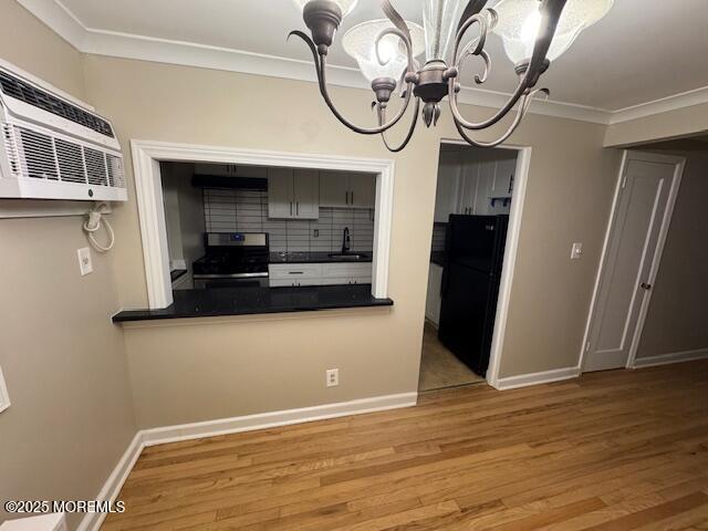 82 Manor Drive, Unit 803 Red Bank, NJ 07701 - Photo 9 of 39 a view of a room with wooden floor and a ceiling fan