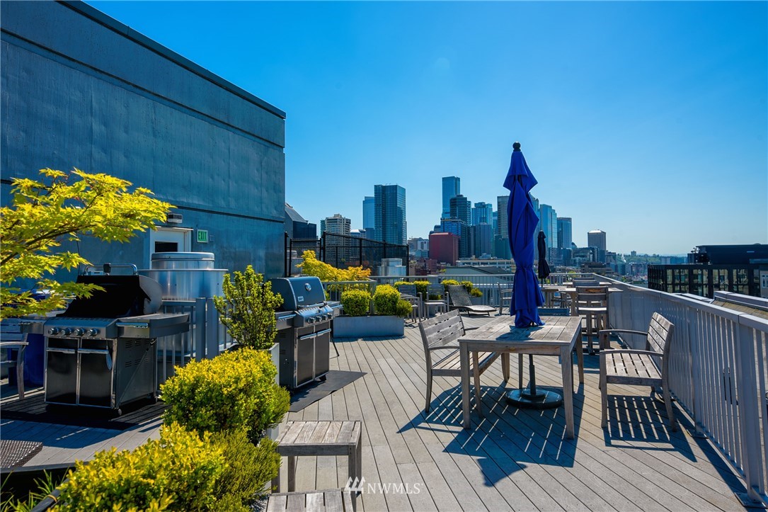 76 Cedar Street, Unit 910 Seattle, WA 98121 - Photo 24 of 30 a view of a terrace with furniture