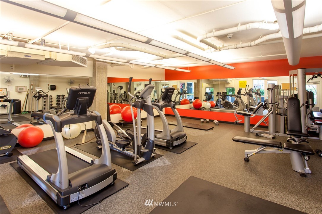 76 Cedar Street, Unit 910 Seattle, WA 98121 - Photo 28 of 30 a view of a room with gym equipment