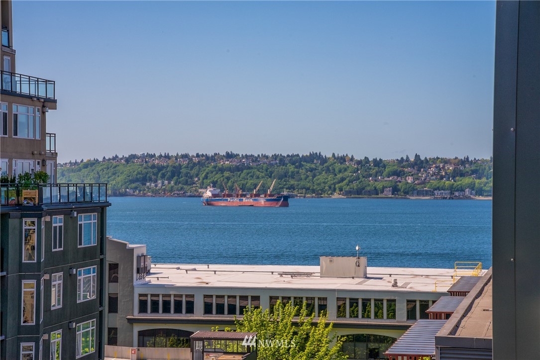 76 Cedar Street, Unit 910 Seattle, WA 98121 - Photo 8 of 30 a view of a city with tall buildings in front of it