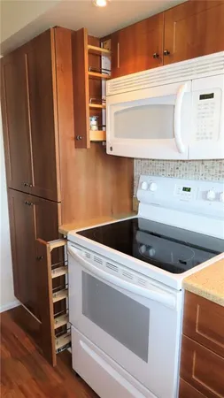 a view of hallway with washer and dryer