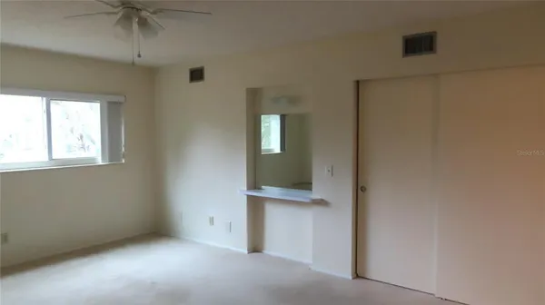 a view of a hallway with closet area