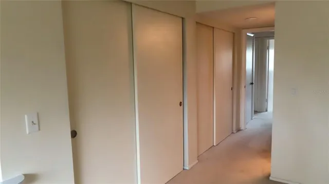 a bathroom with a toilet a sink and shower