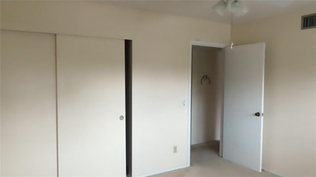 2295 Americus Boulevard East, Unit 29 Clearwater, FL 33763 - Photo 34 of 39 a view of a hallway