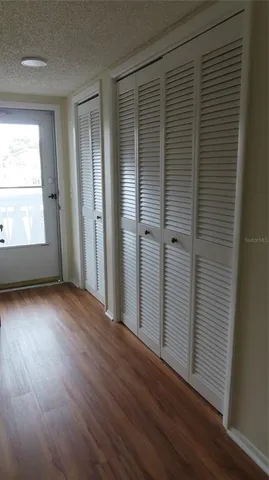 a kitchen with a stove and a microwave
