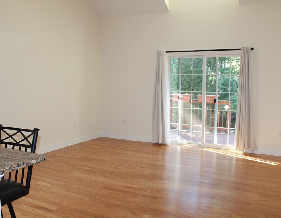53 Baldwin Road, Unit 1501 Billerica, MA 01821 - Photo 11 of 22 a view of empty room with wooden floor and fan