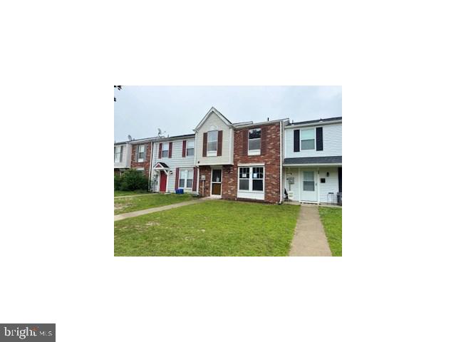41 Vanderbilt Court Sicklerville, NJ 08081 - Photo 2 of 13 a picture of a house with a small yard and a large tree