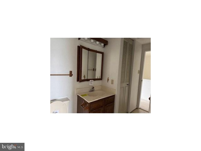 41 Vanderbilt Court Sicklerville, NJ 08081 - Photo 10 of 13 a bathroom with a sink and mirror