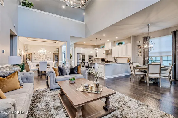 a kitchen with stainless steel appliances granite countertop a stove and a sink
