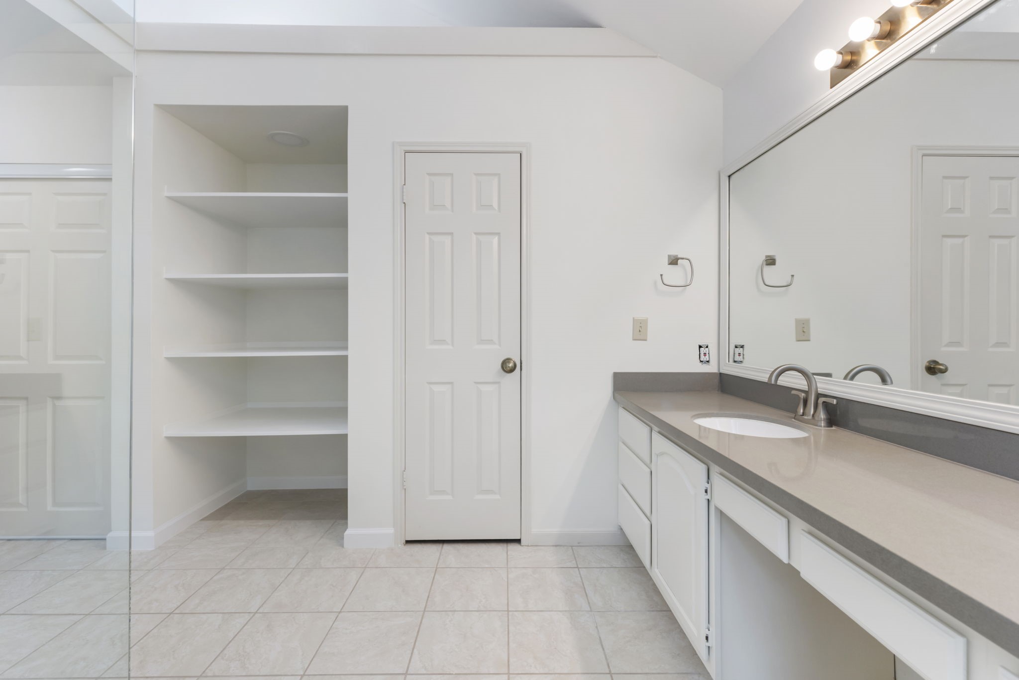 59 Fire Flicker Place Spring, TX 77381 - Photo 22 of 37 Convenient open shelving for towels and a 2 additional closets!