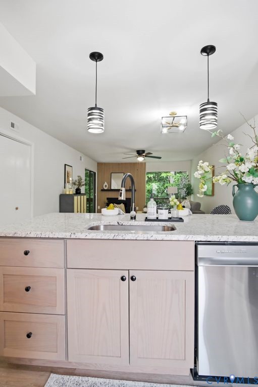 10270 Iron Mill Road Richmond, VA 23235 - Photo 10 of 29 Kitchen island with light-toned wood cabinetry and