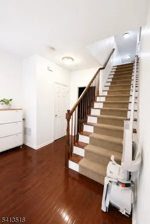 a view of entryway with wooden floor
