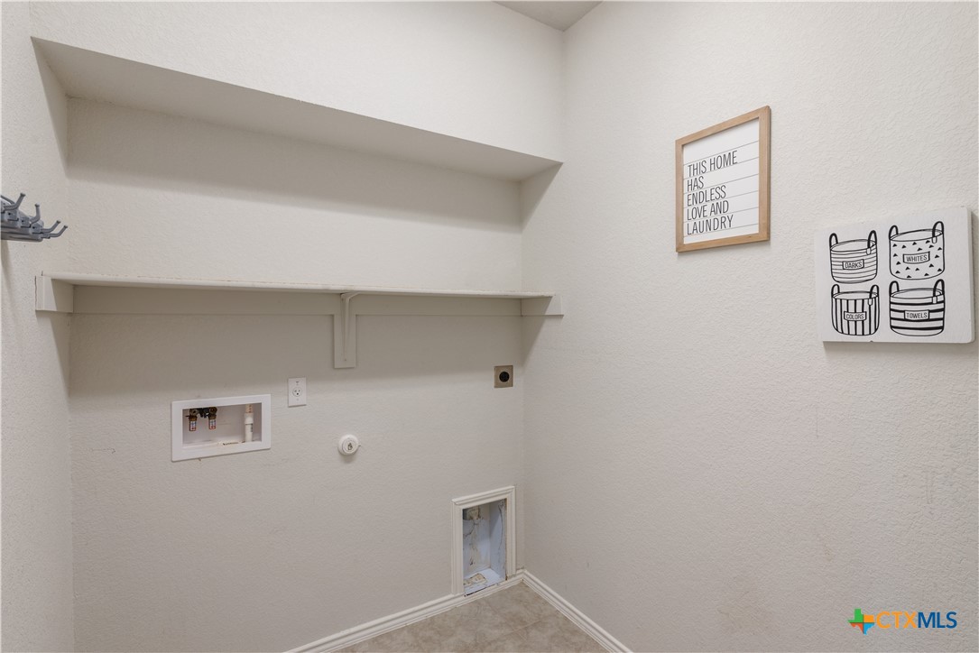 1129 Ibis Falls Loop Jarrell, TX 76537 - Photo 22 of 39 a view of cupboard