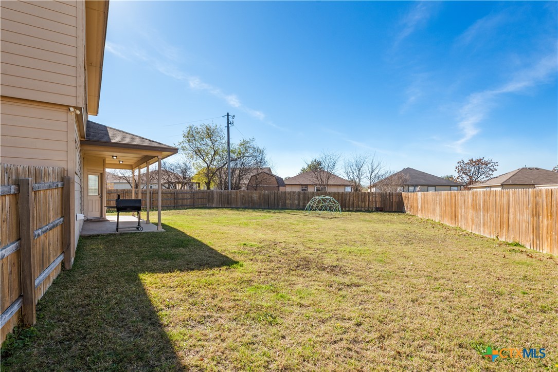 1129 Ibis Falls Loop Jarrell, TX 76537 - Photo 37 of 39 a view of an outdoor space and swimming pool