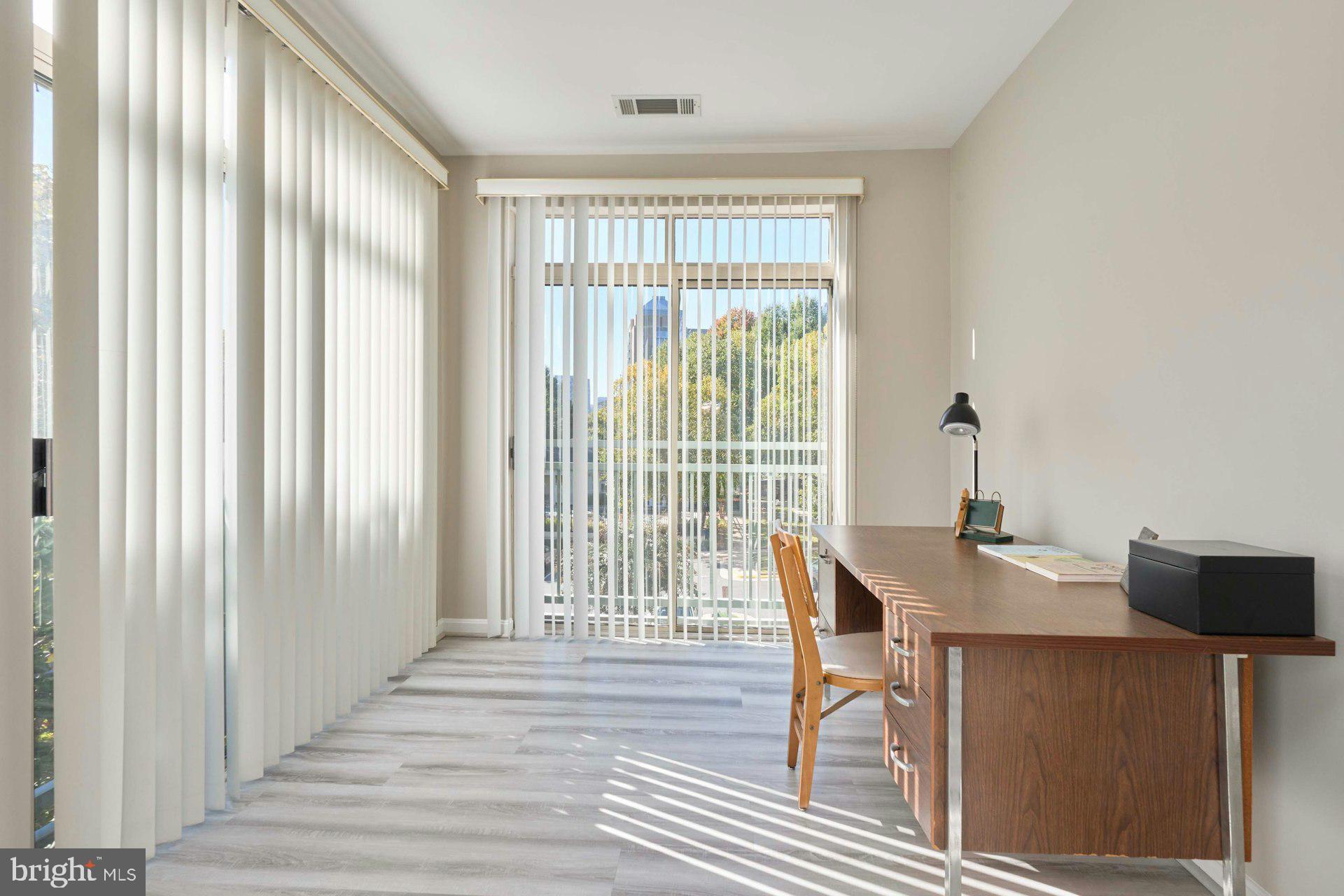 1851 Stratford Park Place, Unit 212 Reston, VA 20190 - Photo 16 of 40 a workspace with furniture and a window