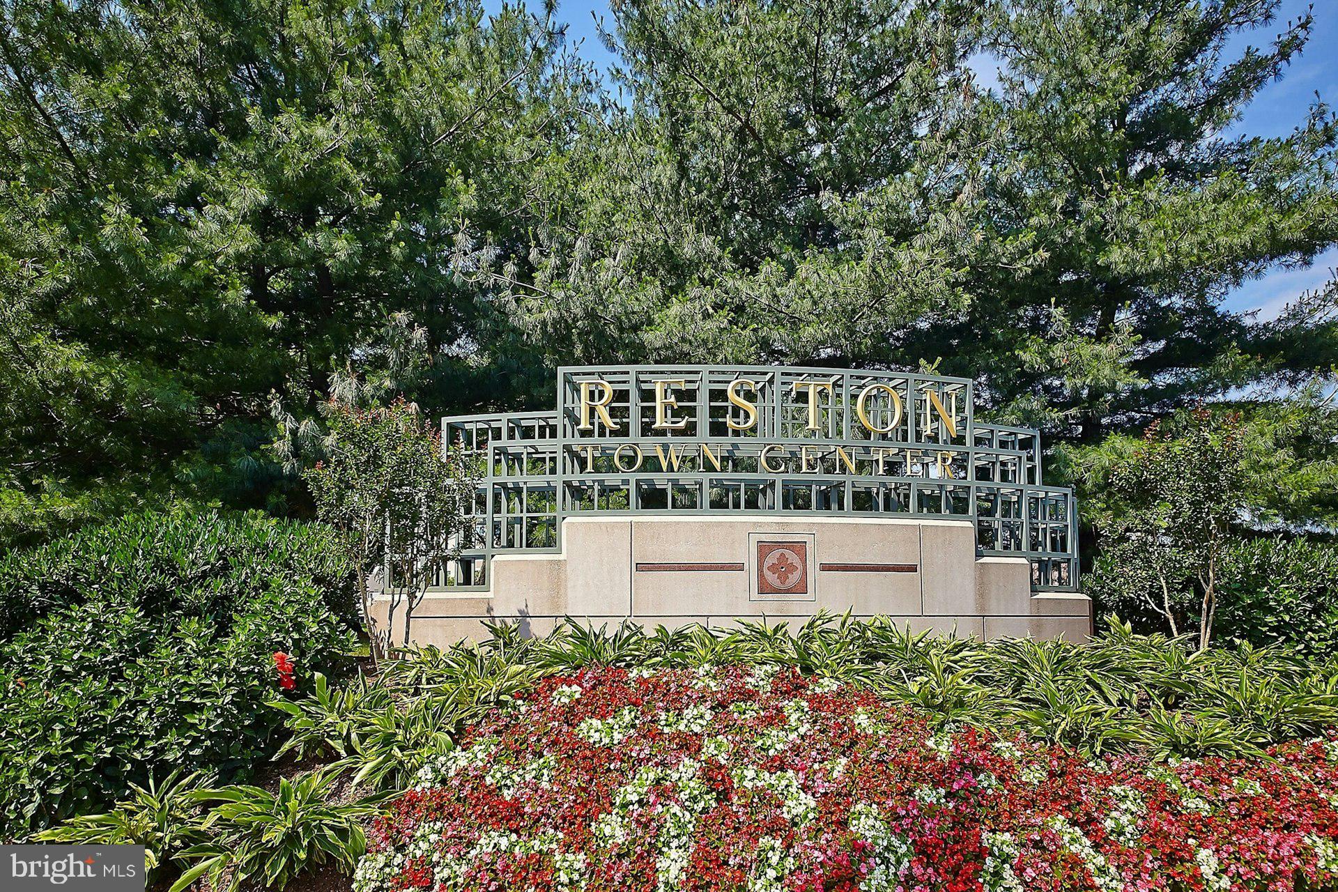 1851 Stratford Park Place, Unit 212 Reston, VA 20190 - Photo 30 of 39 a view of a chairs and bench