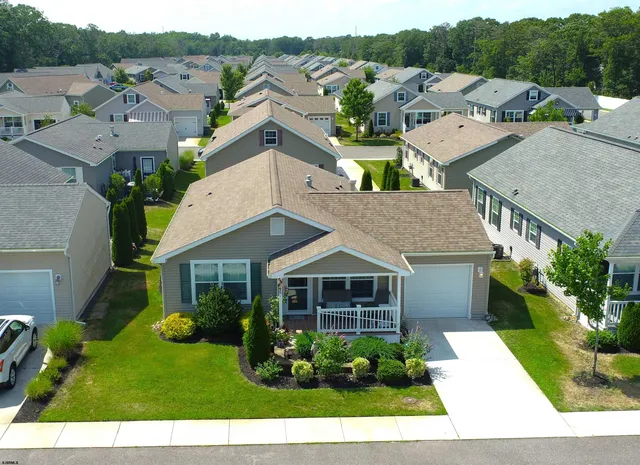 a view of a house with a garden