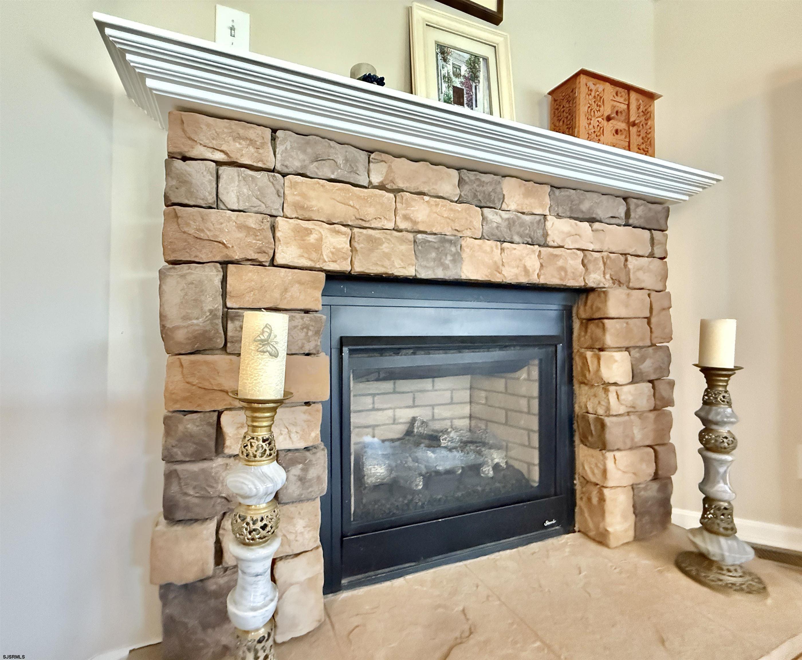 2058 South Shore Rd (route 9) Ocean View, NJ 08230 - Photo 15 of 36 a front view of a fireplace with wooden floor