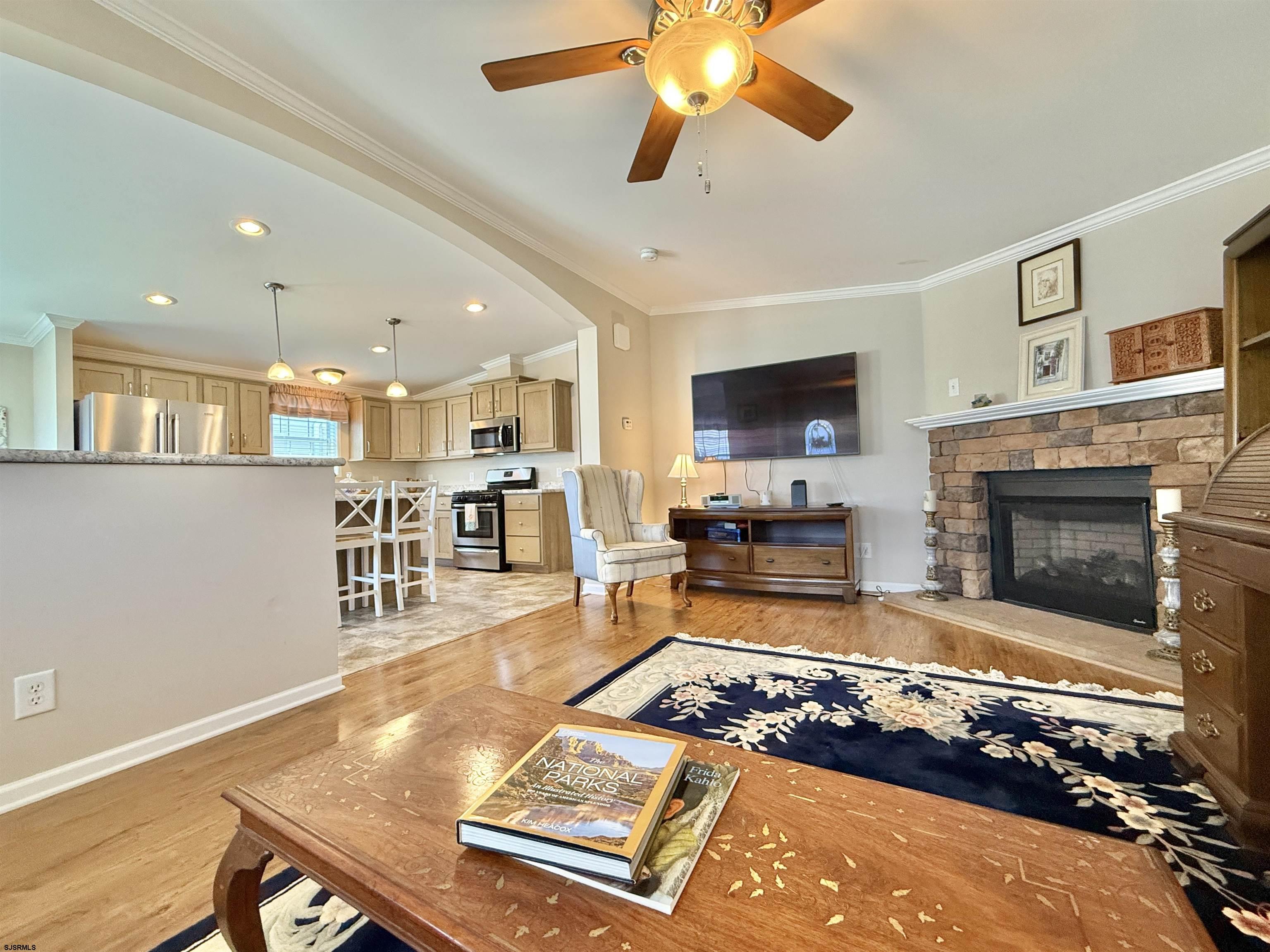 2058 South Shore Rd (route 9) Ocean View, NJ 08230 - Photo 17 of 36 a living room with stainless steel appliances furniture fireplace and flat screen tv