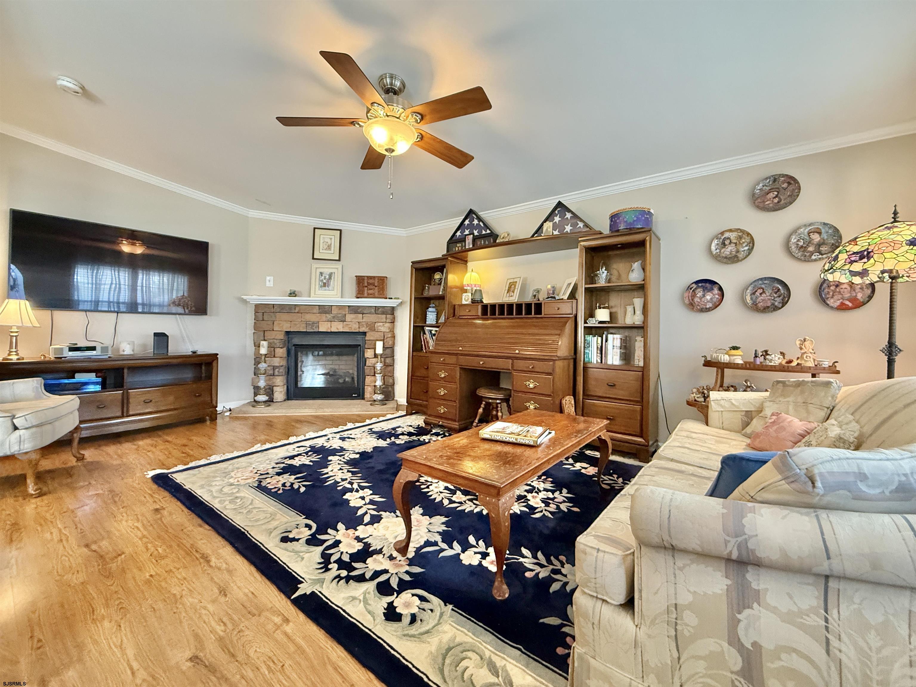 2058 South Shore Rd (route 9) Ocean View, NJ 08230 - Photo 18 of 36 a living room with furniture and a fireplace