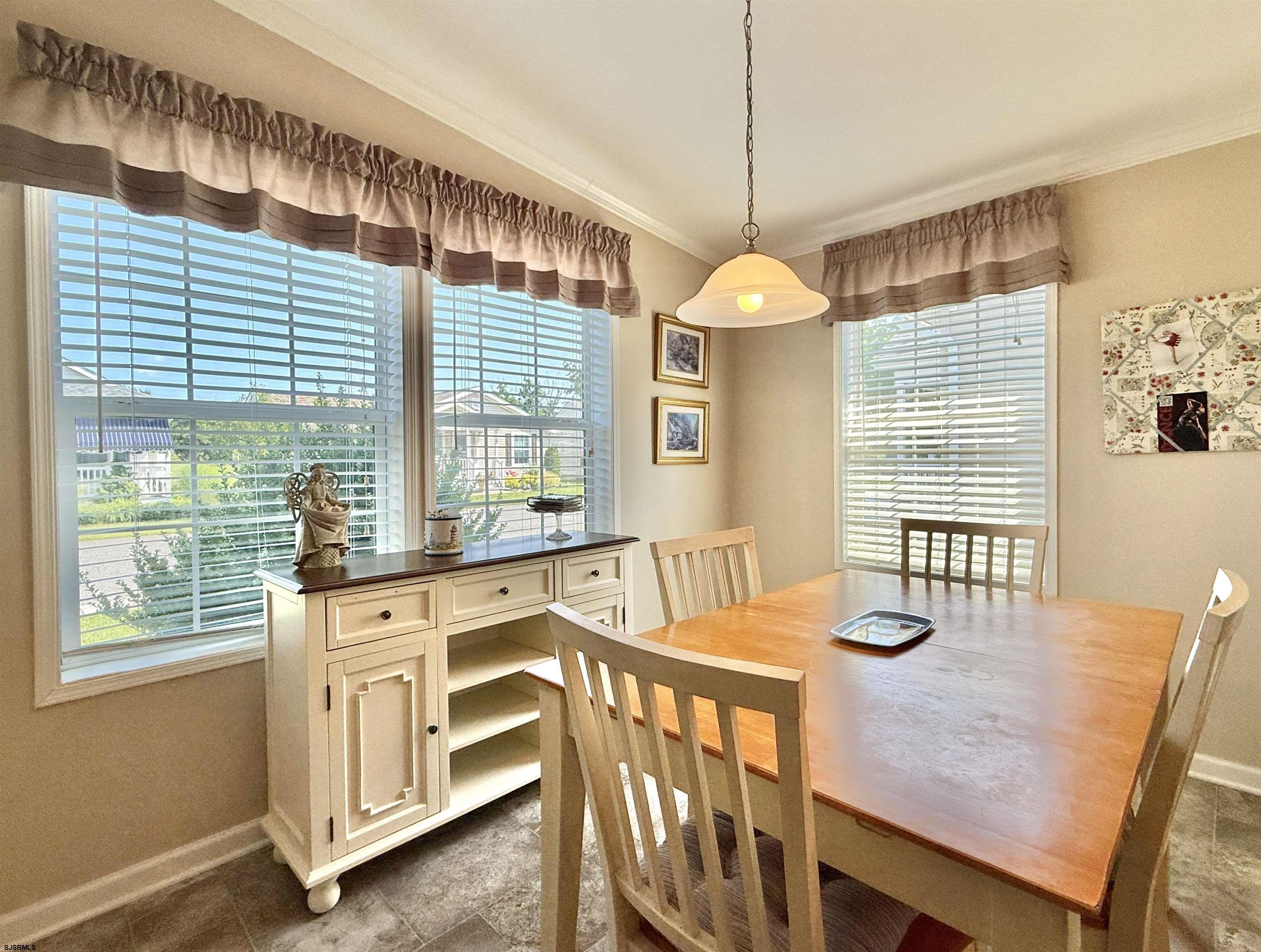 2058 South Shore Rd (route 9) Ocean View, NJ 08230 - Photo 19 of 36 a dining room with furniture and window