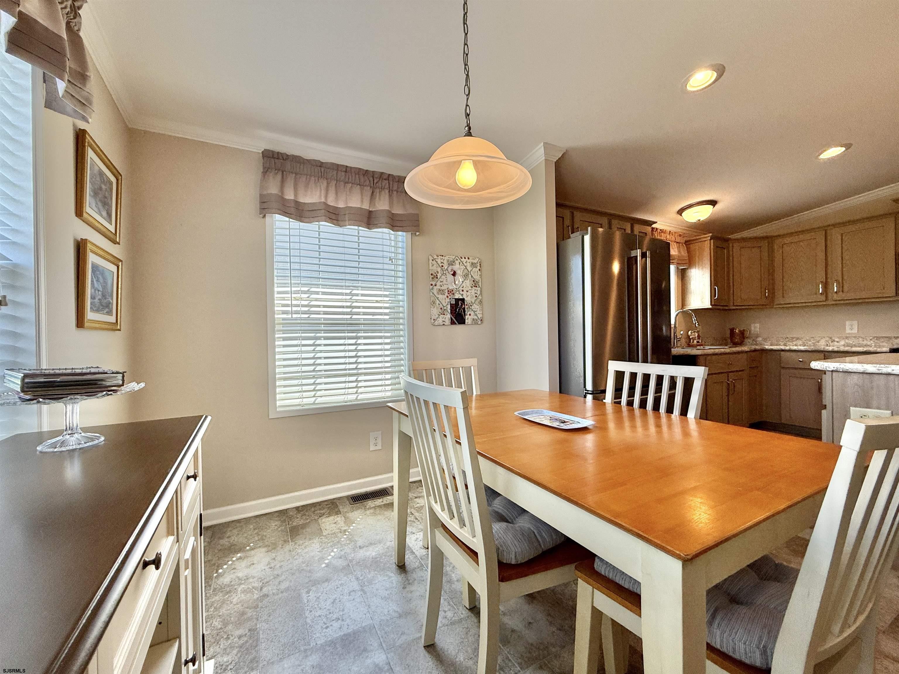 2058 South Shore Rd (route 9) Ocean View, NJ 08230 - Photo 21 of 36 a kitchen with stainless steel appliances granite countertop a sink a stove and a refrigerator