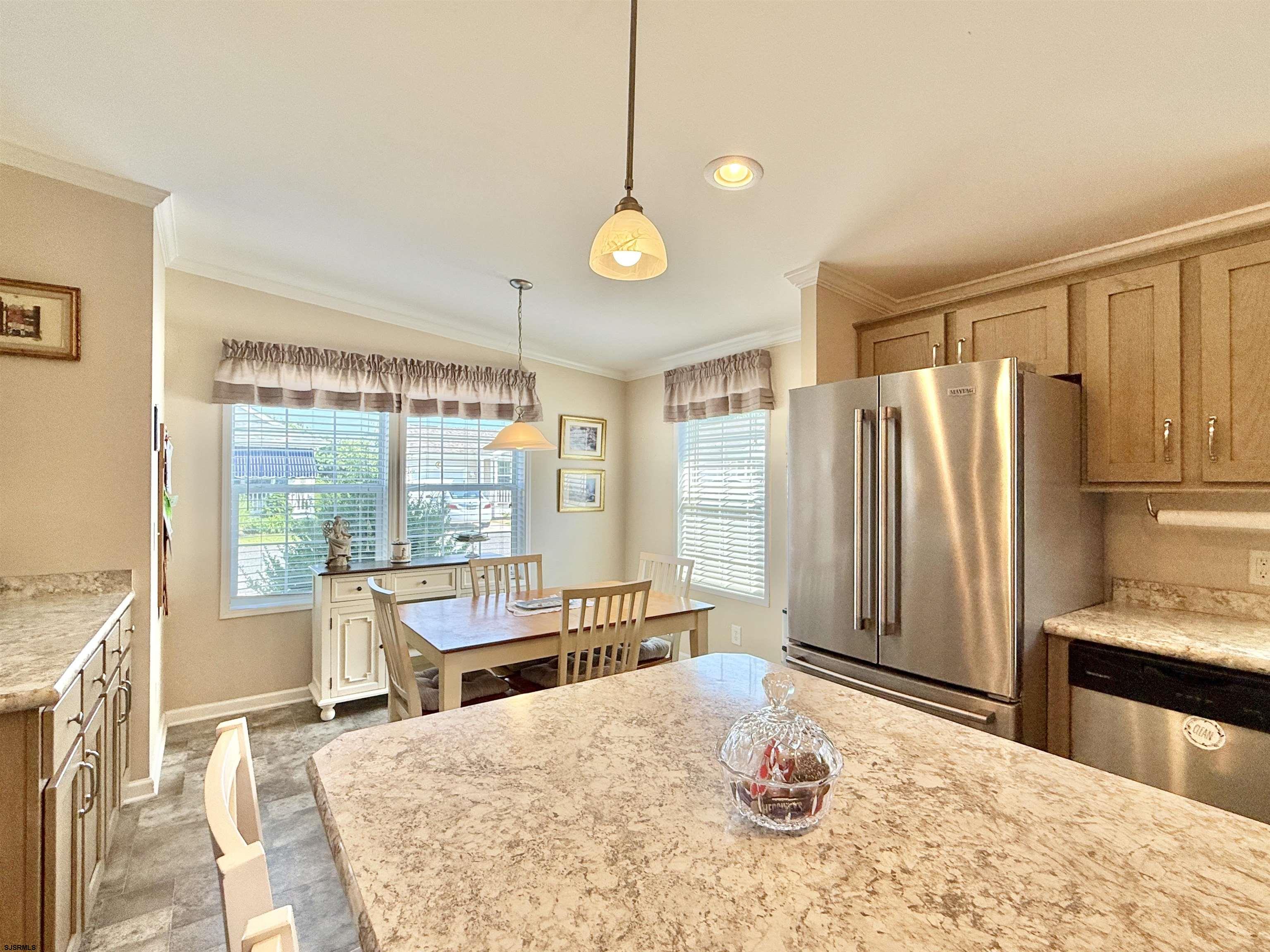 2058 South Shore Rd (route 9) Ocean View, NJ 08230 - Photo 24 of 36 a large kitchen with a table and chairs