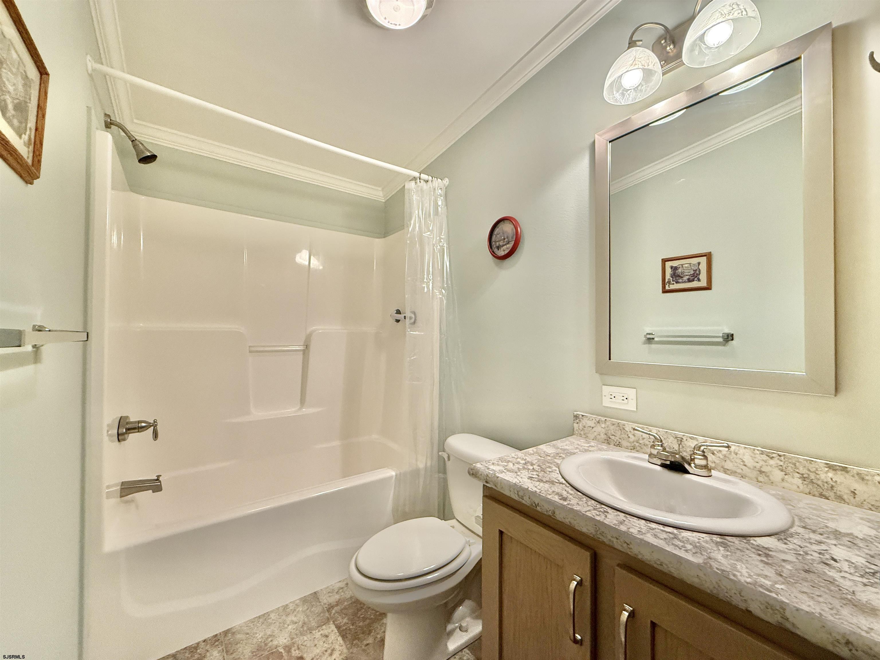2058 South Shore Rd (route 9) Ocean View, NJ 08230 - Photo 29 of 36 a bathroom with a granite countertop sink toilet and shower