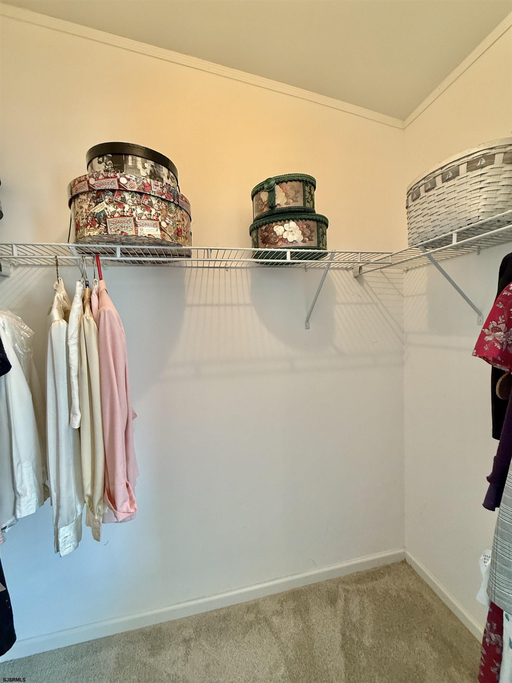 2058 South Shore Rd (route 9) Ocean View, NJ 08230 - Photo 35 of 36 a view of walk in closet with clothes and shoes