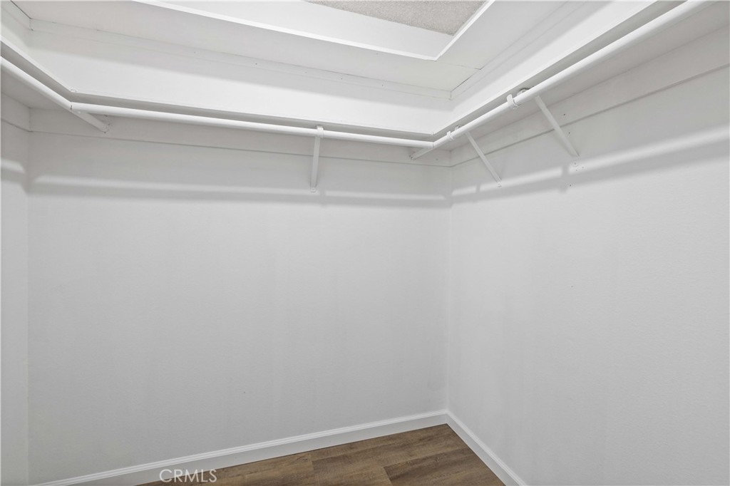 26562 Cardwick Court Newhall, CA 91321 - Photo 17 of 34 a view of a room with shelf on the wall